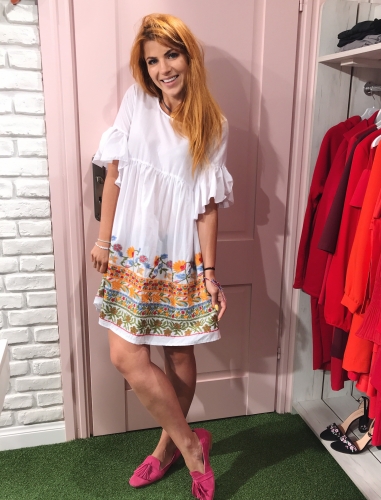 White dress with multicoloured embroidery