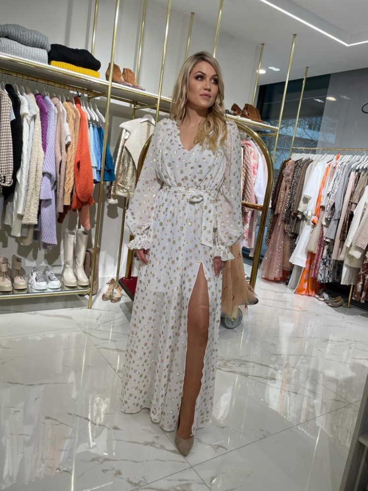 Długa biała sukienka z rozporkiem w złote groszki Isis by Swing