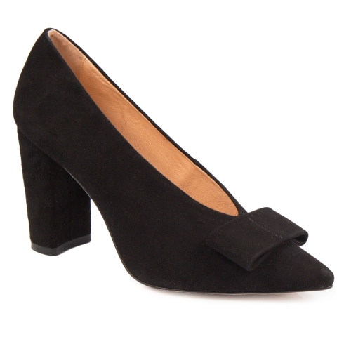 Black suede pumps on post with bow